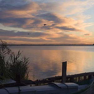 Amanecer albufera silla paisaje barca nubes
